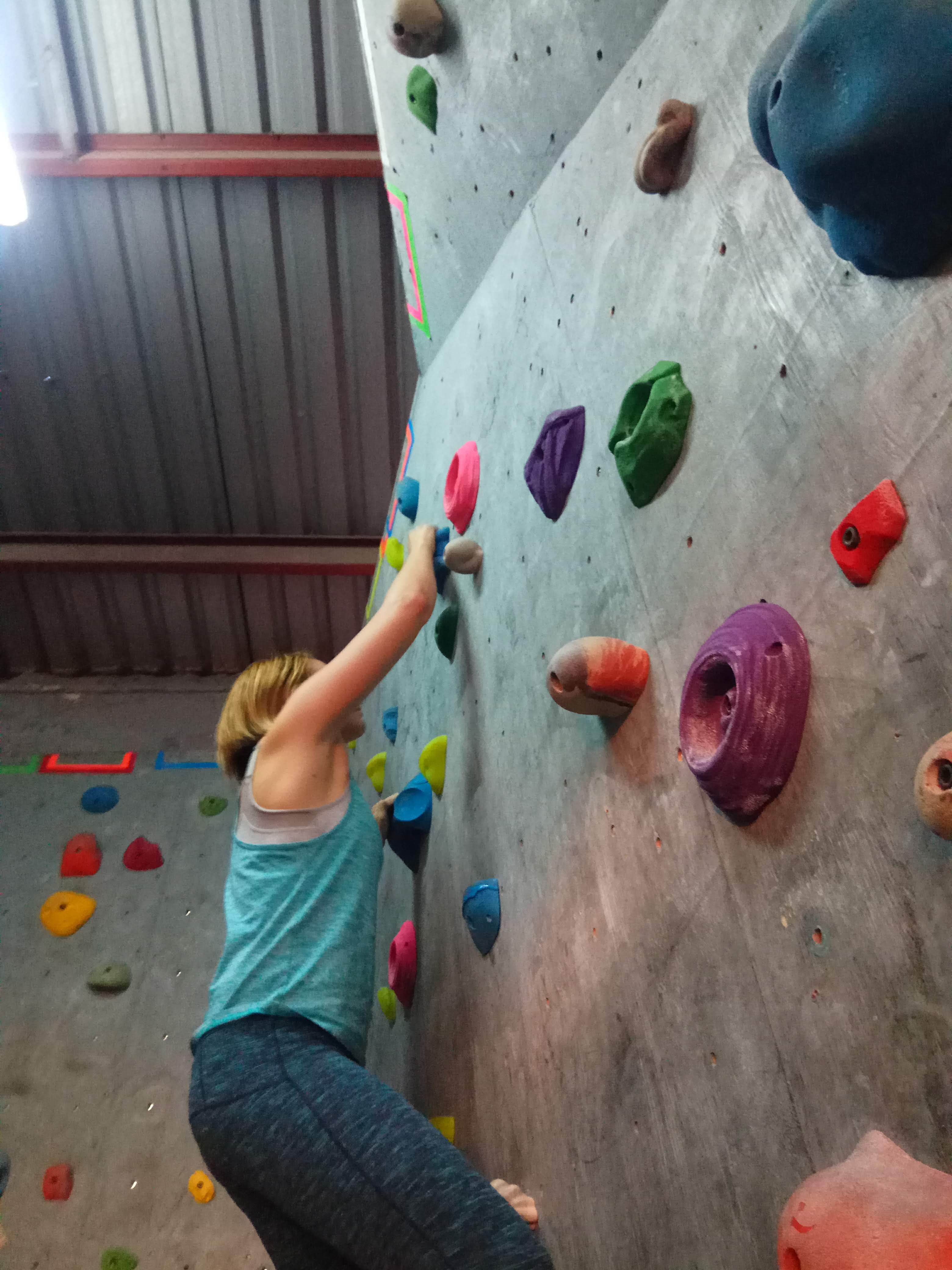 Me on the wall at BlueSky Climbing Gym