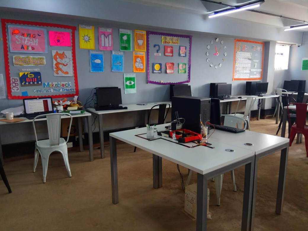 Collage posters on the wall of the STEM Lab at Kibera School for Girls