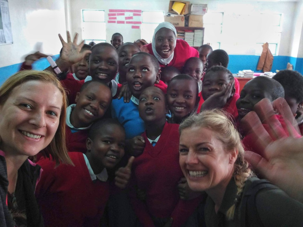 Me and Amy having a selfie with the 7th Graders at Kibera School for Girls