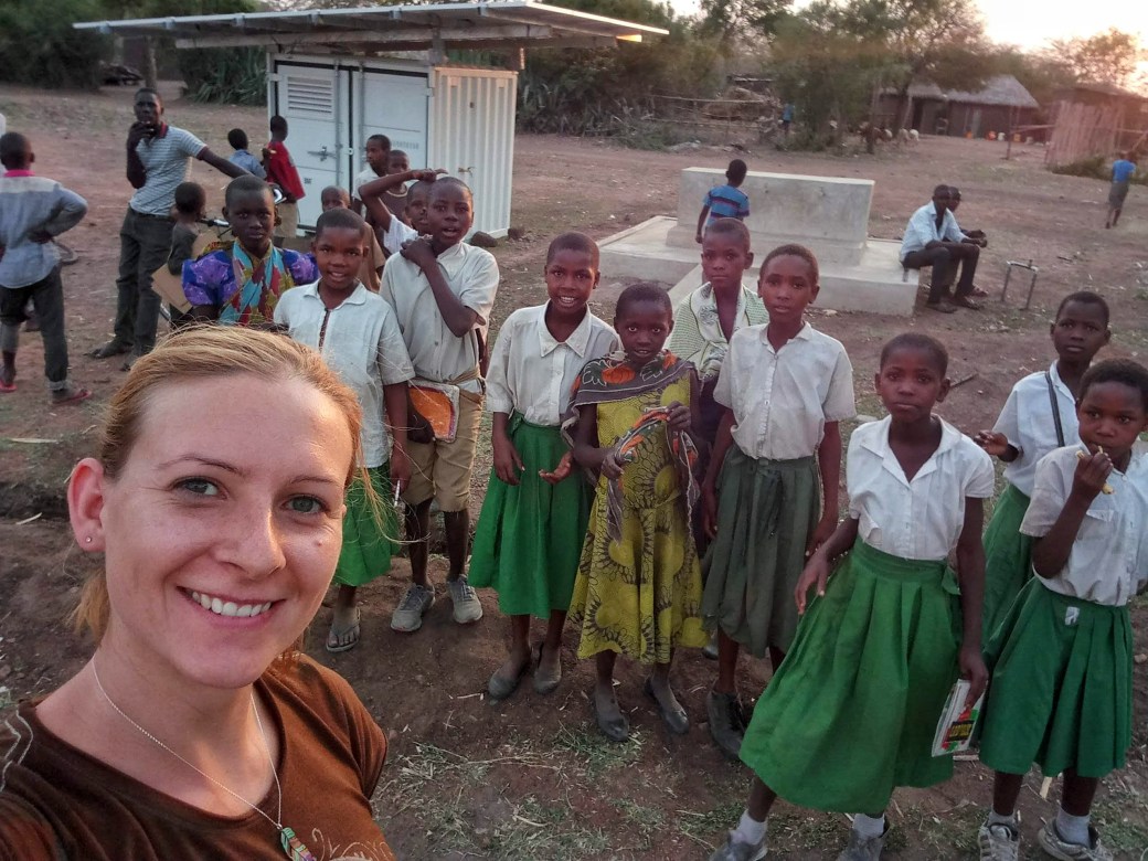Me with a crowd of schoolchildren who were watching me work 