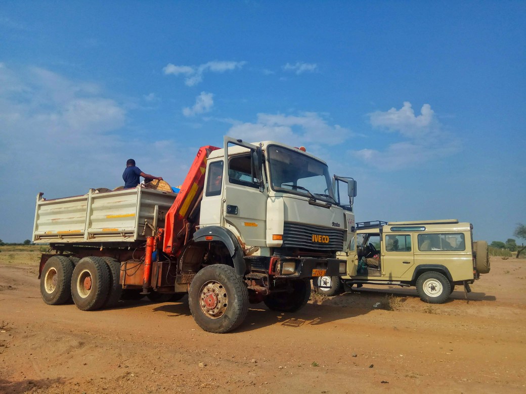 A truck laden with huge cable reels