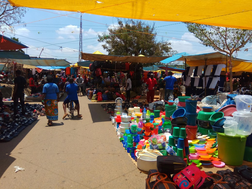 Colourful stacks of plastic pots at the Saba Saba market in Morogoro