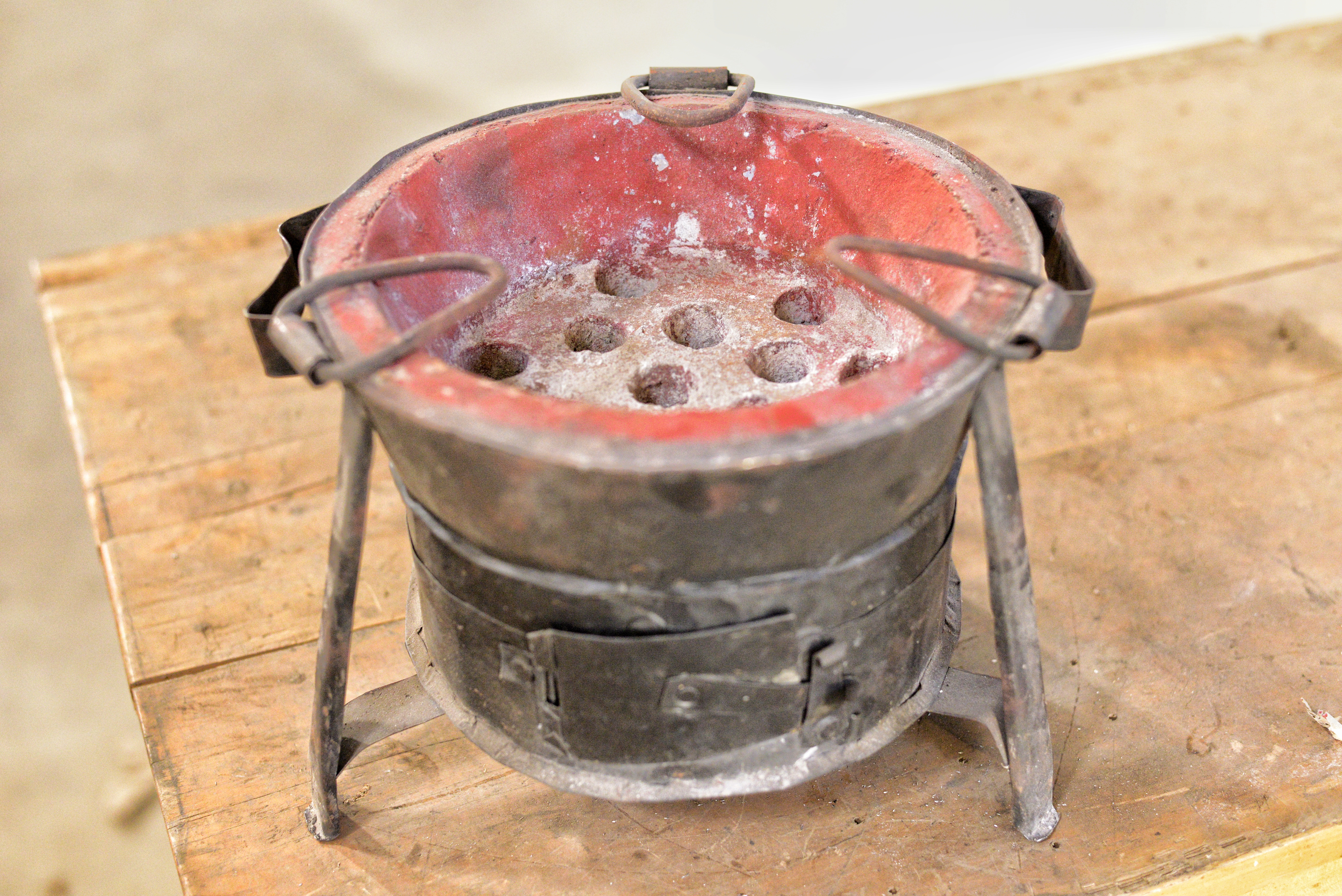 A close up of a traditional Kenyan stove