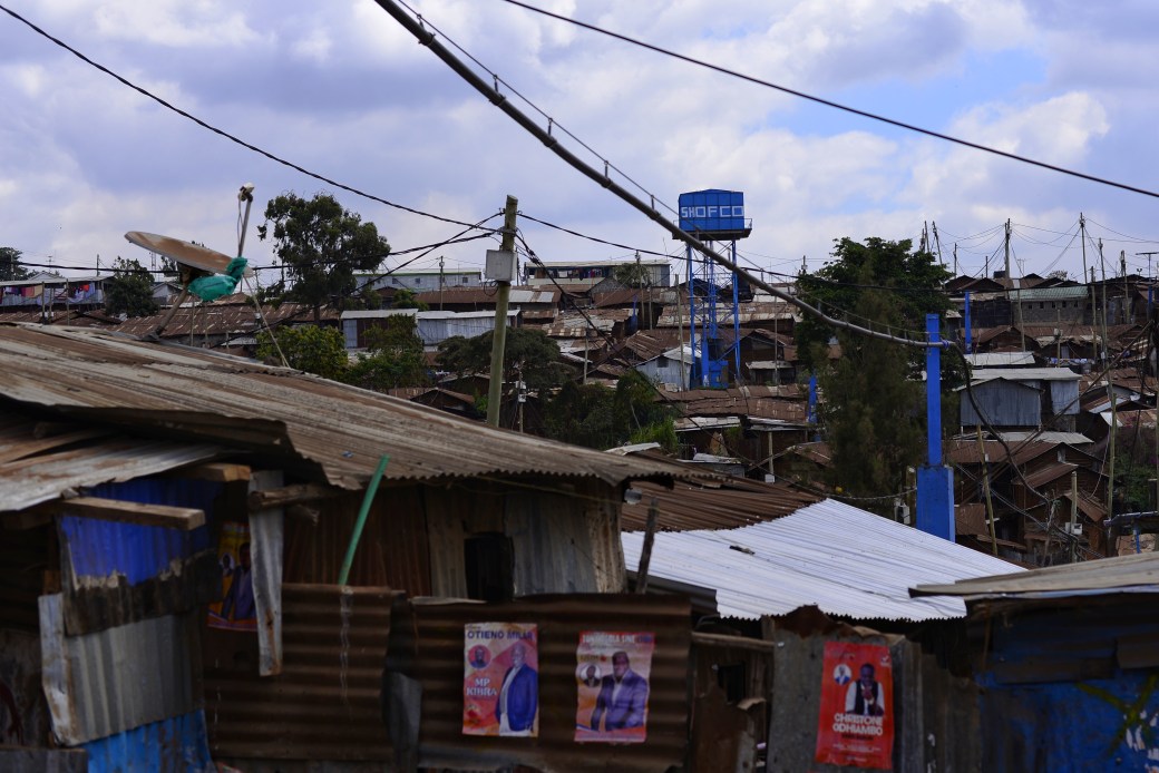 A SHOFCO water tower visible over an area of the Kibera Slum